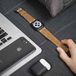 Smoked-Walnut-Apple-watch-brown-leather-vintage-band-on-top-grey-sofa-bs