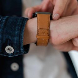 Goldstone-AW-light-brown-nappa-band-with-hot-stamp-monogram-close-to-a-jeans-jacket