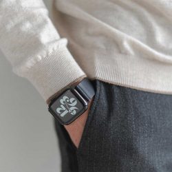 Cassel-Apple-eatch-black-full-grain-leather-band-getting-out-from-a-pocket-of-an-elegant-pant