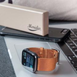 Tawny-AW-brown-full-grain-leather-band-on-macbook-pro
