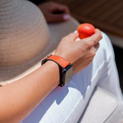 Lobster-Apple-watch-red-orange-rubber-band-keeping-a-tomato-in-own-hands
