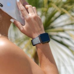 Summer-cloud-Apple-wtch-grey-rubber-band-keeping-an-iphone