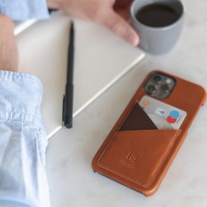Barrel-iPhone-12-pro-max-light-brown-leather-case-on-top-of-a-marble