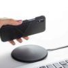 Cosmos-Iphone-dark-grey-leather-case-on-top-of-a-wireless-charger-bs