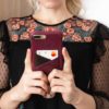 Grapevine-Iphone-bordeaux-leather-case-handmade-by-a-woman-wear-a-black-elegant-dress-bs