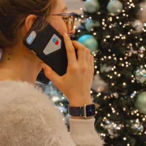 Arctic-Night-and-Cosmos-iphone-leather-case-close-to-a-christams-tree