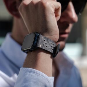 AW-bullet-proof-grey-leather-band-close-up-in-a-sunny-day
