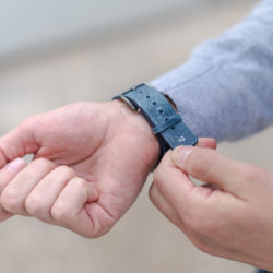 AW-bullet-proof-grey-leather-band-with-focus-on-monogram