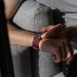 AW-bullet-proof-red-leather-band-in-a-sunny-day-for-him