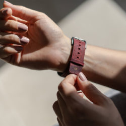 AW-bullet-proof-red-leather-band-with-focus-on-monogram