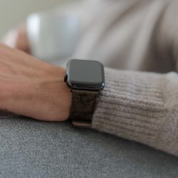 Deep-Fossil-AW-brown-ancient-leather-band-for-him-on-sofa