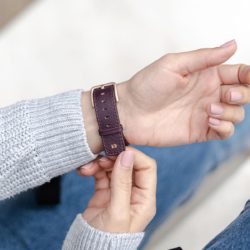 Galaxy-watch-active-burgundy-leather-band-with-focus-on-monogram