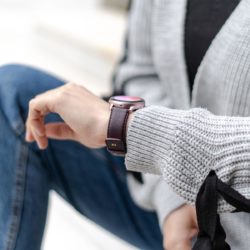 Galaxy-watch-active-burgundy-leather-band-with-focus-on-monogram-side