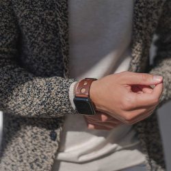 AW dark brown full grain leather band for man in a sunny day
