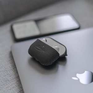Airpods_Pro_JET_BLACK_leather_case-on-top-of-a-macbook