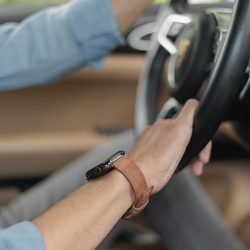 Recycled-Toffee-cotton-apple-watch-band-for-him-in-a-sport-car
